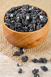 黑莓或黑果子浆 放在木碗里草本植物桌子黑米烹饪保健枸杞医学干果紫色饮食图片