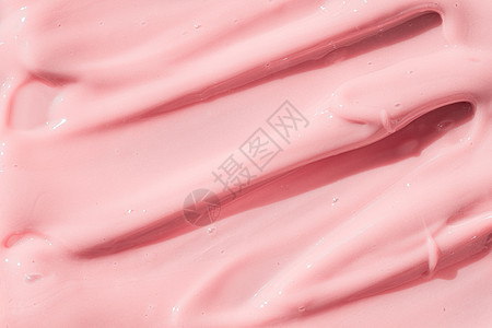 粉色化妆品奶油乳液润滑剂涂片样本 美容奶油纹理背景 皮肤护理产品中风缝合图片