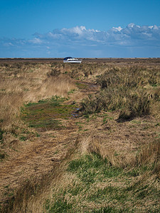 盐沼地上的船 布雷克尼国家自然保护区 诺福克图片