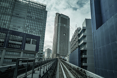 东京市路西运输大楼 从电线观测到东京交通大厦城市办公楼景观街景商业建筑群火车蓝天机车天空图片
