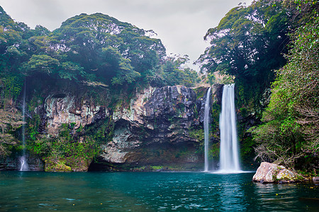 南韩济州岛千吉燕坠落池塘溪流森林公园景点旅游悬崖岩石瀑布石头图片