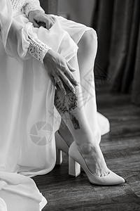 新娘的新婚鞋珠光奢华女性花束仪式宝气裙子魅力婚礼庆典图片