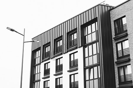 现代公寓楼的外观 现代建筑的抽象几何背景景观摩天大楼游客建筑学观光首都街道中心建筑物历史性图片