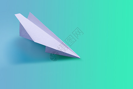 以调音为背景的纸制飞机翅膀玩具电报闲暇蓝色旅行空气笔记运输商业图片