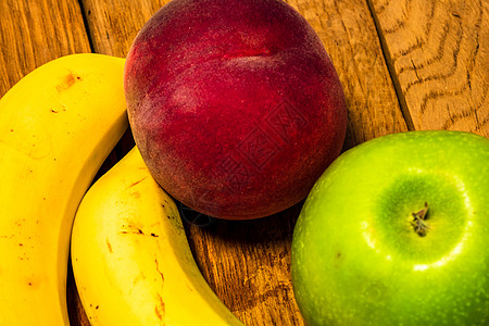 木制桌上新鲜果实的混合食物收成香蕉营养桌子油桃橙子团体维生素饮食图片