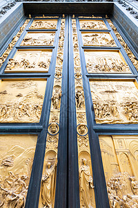 佛罗伦萨天堂之门 佛罗伦萨洗礼堂的主要旧门位于大教堂前洗礼入口通道天空天堂出口艺术金子信仰宗教图片