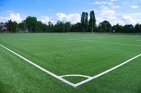 绿色足球场的白线角课程竞赛地面游戏体育场场地草地运动白色足球图片