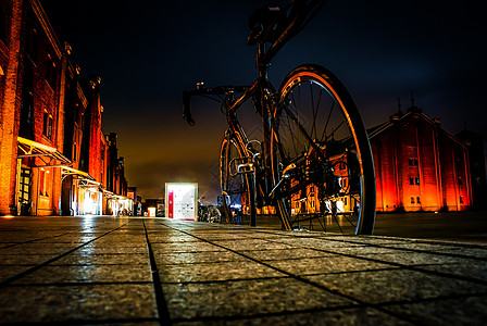 港未来夜景夜间横滨自行车Load Bike城市景点旅游踏板建筑群建筑车轮摩天大楼机构车手背景