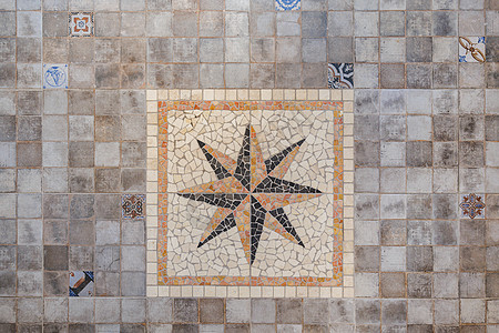 装饰性灰色地板砖 中间有八点大恒星 位于方形图片