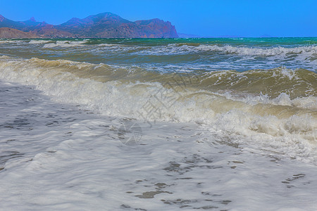 海岸海浪和斗篷的风景图片