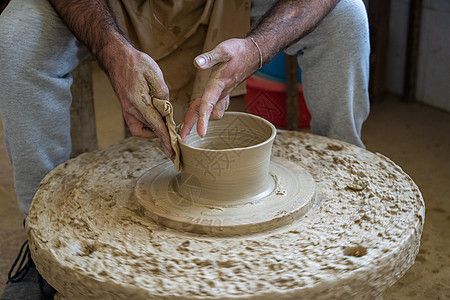 塑造一块粘土的波特用具泥板灰色制品盘子餐具厨房手工文化石头图片