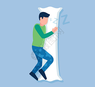 穿着睡衣的男人拥抱着一个长枕头图片