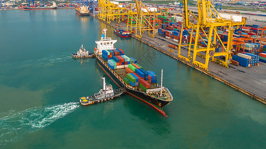 集装箱船运载集装箱箱进出口到商业港口 全球商业货运商业贸易物流和集装箱船在全球范围内的海外运输货物拖船血管船舶送货海洋经济起重机图片