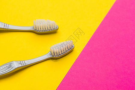 平面成像和彩色背景的人工牙刷 闭合牙科乐器刷子微笑浴室安全呼吸治疗口服预防图片