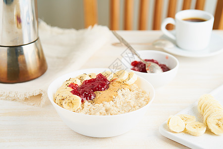 燕麦饭 一大碗美味健康的汤粥 早餐 早饭桌子种子化合物食物香蕉乡村椅子麦片饮食维生素图片