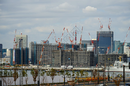 奥林匹克运动员村建筑景观公寓机器摩天大楼晴天设施房子机构业务房地产城市图片