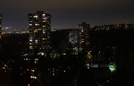 带有光星效果图像的夜间城市景色图片