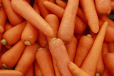 特写食品蔬菜胡萝卜 新鲜的大橙色红萝卜纹理背景 胡萝卜的背景照片图片