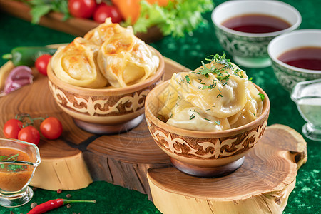 东方国家传统面子马尼特香菜美食木头蔬菜国家午餐饺子盘子烹饪牛肉图片