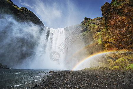 冰岛南部靠近冰岛的Skogafos大瀑布假期溪流冒险彩虹天空火山活力瀑布游客旅行图片