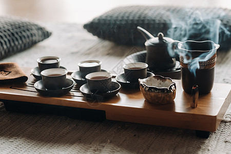 准备和一家大公司举行茶茶仪式礼仪浓茶开水餐具文化杯子太阳神茶杯陶瓷传统背景图片