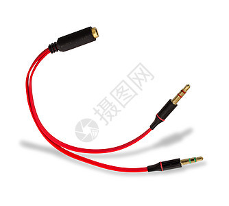 带阴影的白色背景上的音频电缆 调适器线连接器红色电子模拟插头技术立体声音乐宏观绿色图片