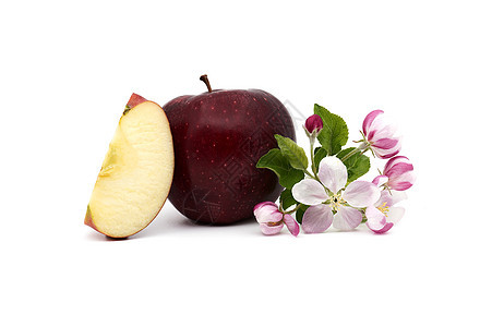 红苹果在苹果切片和苹果花边植物红色小吃白色树叶食物绿色叶子水果花瓣图片