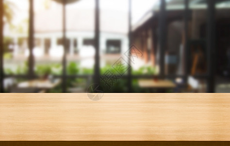 现代餐馆背景模糊的木板餐桌建筑桌面产品木头店铺窗户派对架子桌子餐厅图片