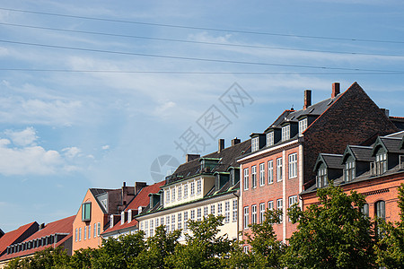 丹麦哥本哈根古老房屋的彩色外表 克里斯蒂安沙文运河入室窗户街道建筑旅行投资地标景观中心吸引力图片