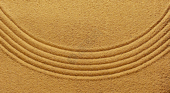 夏季黄色温暖沙子的背景 带有抽象的图案背景图片