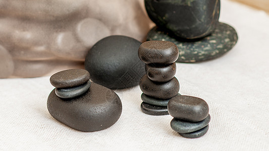 一套按摩石温泉石头冥想疗法和平蜡烛沙龙福利药品岩石图片