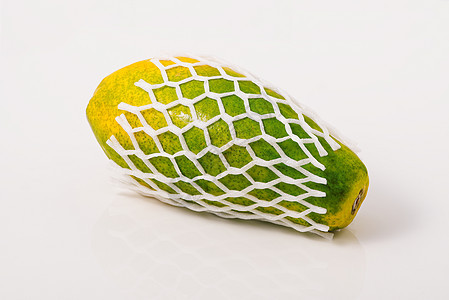 靠近熟熟木瓜 观望木瓜内部 甜甜的热带水果食物橙子黑色绿色甜点营养饮食情调白色黄色图片
