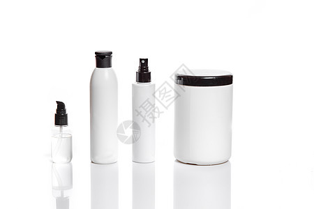 一套装在白色容器中的化妆品 放在浅色背景上奢华润肤管子美容清洁剂面膜对象静物玻璃护理图片