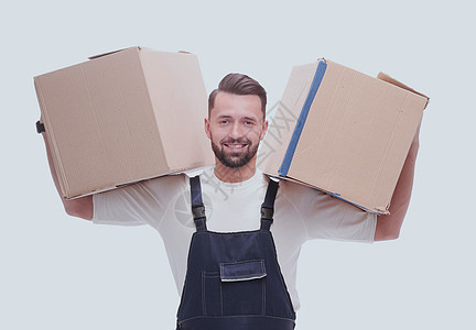 一个带着纸板盒的笑脸人 肩膀上有纸箱包装载体送货货运服务纸板男人导游邮政盒子图片