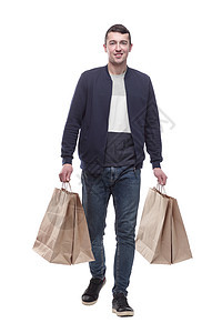 青年男子 有购物袋往前排购物者夹克衣服服装男性顾客跨步销售折扣购物图片