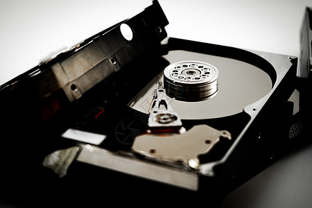 拆散的硬盘驱动器图像储存电子工作介质磁盘基质科学电子元件机器电子产品图片