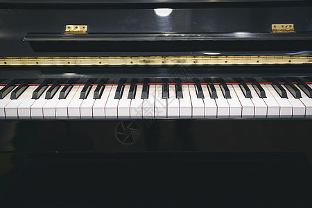 带有黑色和白色光滑的黑白密钥的钢琴键盘 经典音乐乐器娱乐教育爱好学习音乐会音乐家旋律乐队钥匙图片