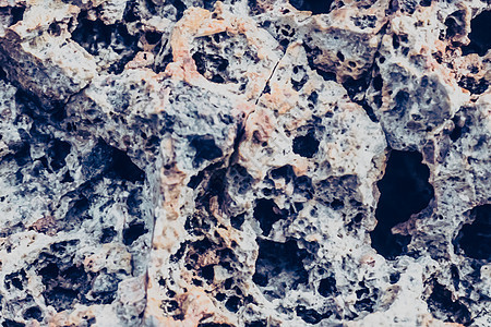 本公司特写时详细介绍了干岩裂石固体泡沫形成层或熔岩火山 古月球风格的微木质素 浅粉色紫色灰色旧存货 淡粉红色优雅耐用性浴室摄影艺图片