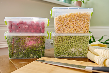 冻冻的蔬菜和水果 紧闭冷冻的绿洋葱 豌豆 樱桃 玉米大葱厨房饮食产品营养盘子工作盒子准备冻结图片
