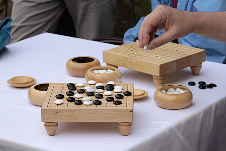 去游戏闲暇木板网格传统围棋玩家桌子战略棋盘石头图片