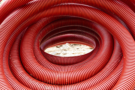 用于地下电线铺设的红花纹pvc管道技术安装材料灵活性接线密闭波纹建筑电气管子图片