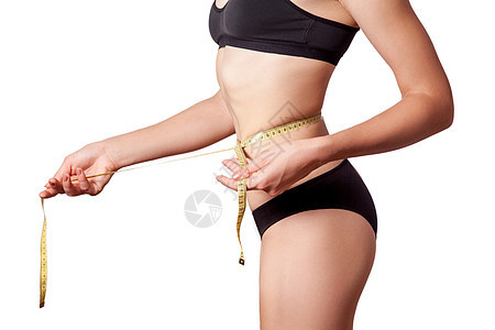 穿着黑色内衣 腰部有测量胶带 用黑色内裤标着她的腰部减肥皮肤生活方式损失重量饮食营养幸福腰围仪表图片