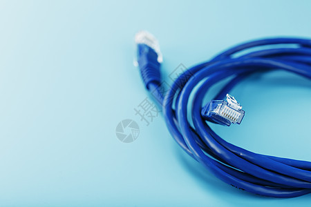 蓝色以太网电缆绳索 蓝背景 有自由空间宽带电讯技术速度路由器电脑局域网数据网络服务器图片