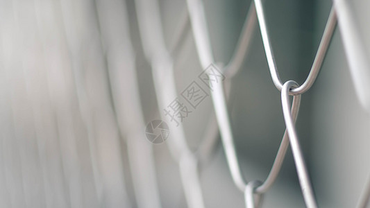 固态金属紧闭钢丝网链链连接点在中的栅栏图片