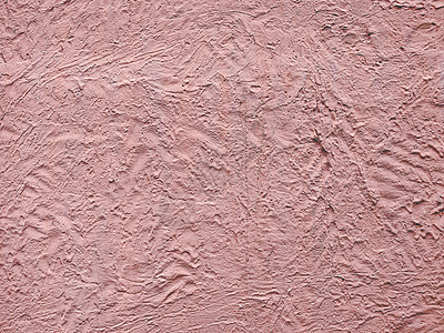 粉色纹理的 stucco 墙抽象背景 建筑中的墙材料和内部装饰思想图片