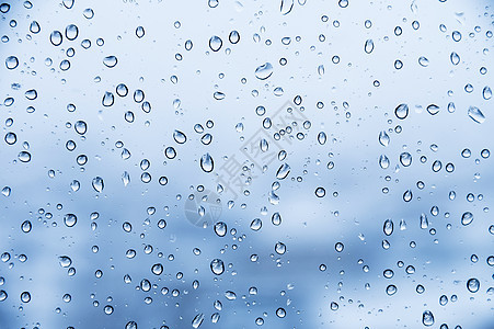 窗口眼镜纹理背景上的雨滴环境气泡玻璃宏观蓝色天气液体窗户墙纸水滴图片