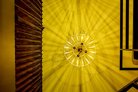 现代天花板顶灯的热彩光装饰灯光设计房间建筑学灯罩风格家庭暖光家具背景图片
