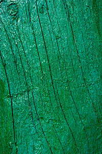 木板上旧绿色的破绿涂料 垂直横幅图片