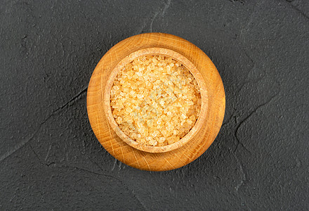 碗中的棕色糖去角质石头水晶厨房蔗糖甘蔗烹饪活力宏观粮食图片