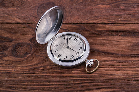 老手表旧袖手表数字时间圆圈金属口袋桌子风格拨号背景